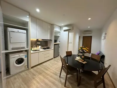 a kitchen and dining room with a table and a dining roomiasm at Joyful Seaview Studio 118 Island88 for 3pax in George Town