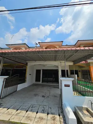 a house with a patio in front of it at Sunrise Hostel in Ipoh