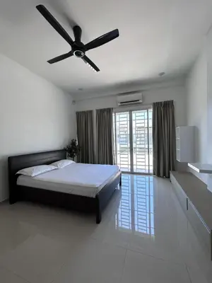 a bedroom with a bed and a ceiling fan at Naura Homes Penang in Kampong Batu Maung