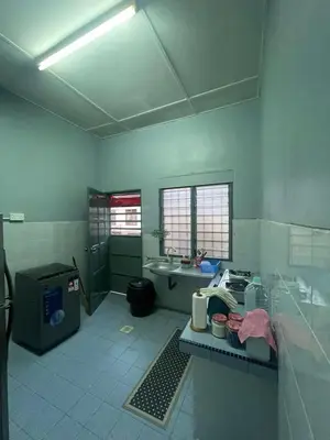 a large bathroom with a sink and a tub at Teratak Bonda Homestay Seri Iskandar in Seri Iskandar