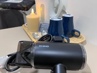 a camera sitting on top of a table with candles at The Little Bali Romance 2pax#Private Bathroom#2min KekLokSi in Ayer Itam