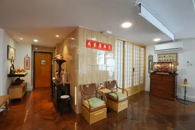 a room with two chairs and a table and a window at Japan Comfort Lifestyle Hokkaido in Ipoh
