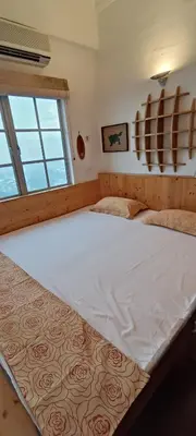 a large bed in a room with a window at Japan Comfort Lifestyle Nagoya in Ipoh