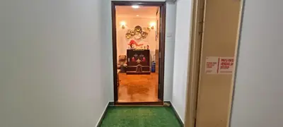 a hallway with a green floor in a room at Japan Comfort Lifestyle Osaka in Ipoh