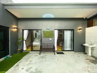 a living room with a couch and a house at Ipoh C Private Club House by Verve EECH109 in Ipoh