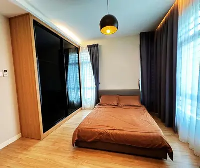 a bedroom with a bed and a large window at Luxury 5BR stay walk to beach & Night market fun in Batu Ferringhi