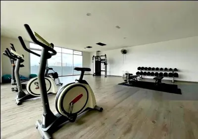 a gym with two exercise bikes in a room at The Paloh Town Suites 4R2B with 2 carpark by IWH Suites in Ipoh