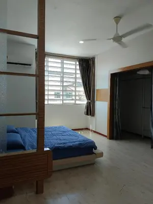a bedroom with a bunk bed and a window at 28 Home in Pusing