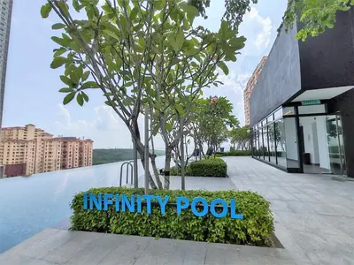 a sign that reads infinity pool in front of a building at Urban Suites, 2 Rooms, 5 Pax, Free Car Park in Jelutong