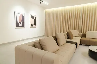 a living room with a couch and a table at Georgetown Stylish Design Jacuzzi KTV 5BR 16pax D in George Town