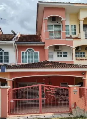 a pink house with a gate in front of it at Glory Homestay Ipoh in Ipoh