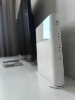 a nintendo wii game controller sitting on a desk at Iconic Regency Service Residences - Xin's Home in Bayan Lepas