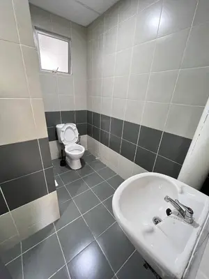 a bathroom with a sink and a toilet at Eisya Homestay 2 at Emerald Avenue Brinchang in Brinchang