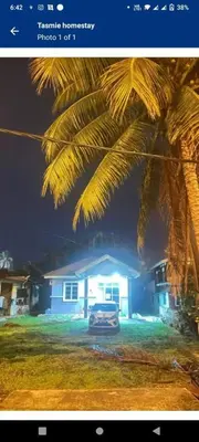 a car parked in front of a house at night at Tasmie homestay in Butterworth