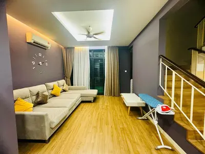 a living room with a couch and a ceiling at Charming Luxury Villa 20,BBQ, Close to Beach Shops in Batu Ferringhi