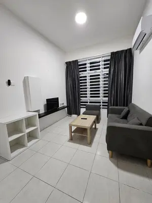 a living room with a couch and a coffee table at Ipoh Town, Anderson Residence in Ipoh