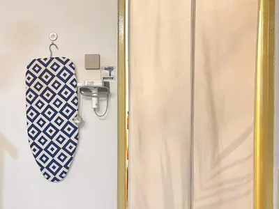 a surfboard hanging on the door of a room at \u5b85\u4e00\u8d77 Tonight29 Ipoh City 14Pax SmartTV Netflix 5G in Ipoh