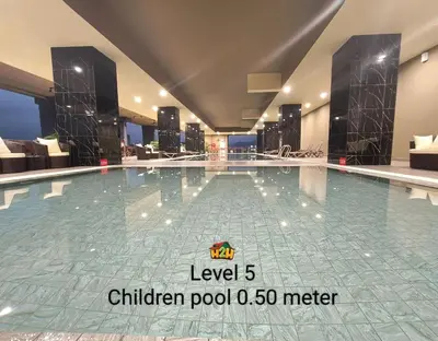 a swimming pool at a children pool meter at ICC Suites Ipoh 202A by H2H in Ipoh