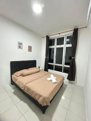 a bedroom with a bed and a window at CT Hillcrest Loft Ipoh in Ipoh