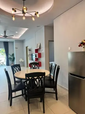 a kitchen and dining room with a table and chairs at AYAAN GAMING HOME at Quintet Play Free GranTurismo in Tanah Rata