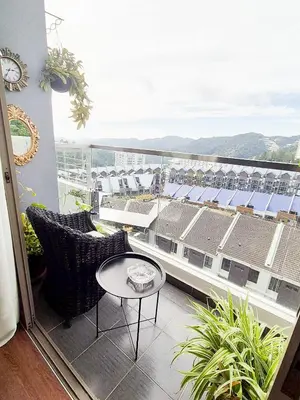 a balcony with a table and chairs on a building at Mossy Forest Family Retreat V, Kea Farm, 2-8 guests, Keafarm, Cameron Highlands in Cameron Highlands