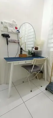 a white desk with a mirror on a white floor at HEE & PENNIE House in Ipoh