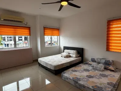 a bedroom with two beds and a ceiling fan at \u73ed\u53f0212\u6c11\u5bbf Pantai Remis in Pantai Remis