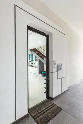 a mirror in the hallway of a house at Cozy Seaview Duplex Apartment at Sunrise Gurney in George Town