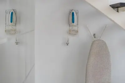 a bathroom with two mirrors and a shower curtain at Maritime Luxury Suite Seaview Sunrise in George Town