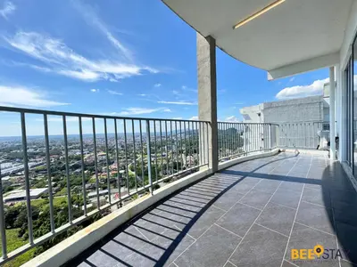 a balcony with a view of the city at Taiping Crystal Creek Condo Pool Gym Netflix in Taiping