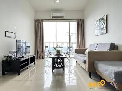 a living room with a couch and a table at Taiping Crystal Creek Condo Pool Gym Netflix in Taiping