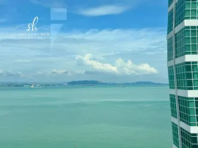 a view of the water from a building at Seaview Maritime Suites, Penang George Town, Karpal Singh Drive-Free Parking by The Stay Hub in George Town