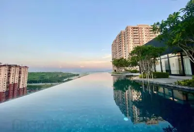 a view of a river with some buildings and trees at Georgetown Penang - Skyline at Urban Suites - Affordable-Luxury-Cozy Stays with Sea and City Views in Jelutong