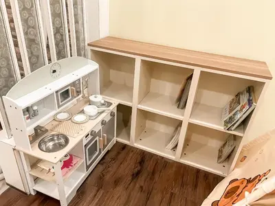 a doll house with a pretend kitchen in a room at Capybara Kids House 12 Pax 5 min to Ipoh Town in Ipoh