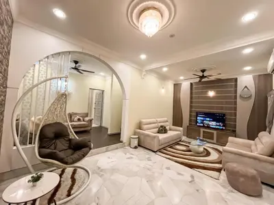 a living room with a large mirror and a swing at Capybara Kids House 12 Pax 5 min to Ipoh Town in Ipoh