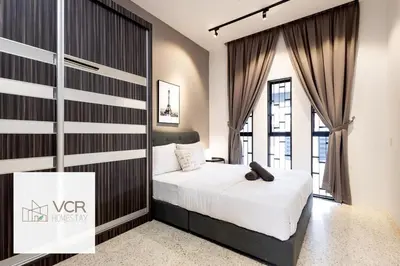a bedroom with a bed and a large window at Yenny Cottage - Canning Private House Spacious in Ipoh