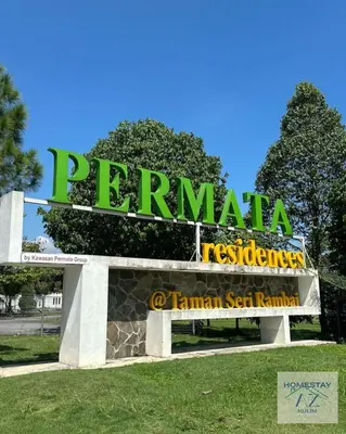 a sign for a restaurant in a park at Homestay AZ Kulim in Kulim