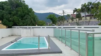 a swimming pool on the roof of a house at BungalowD Pool Villa 7R6B with Netflix Enjoyable Movies & Dramas in Ipoh