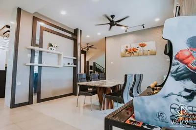 a dining room with a table and chairs at Ipoh VastBlue Escape Pool Villa 6B6B 23Pax in Ipoh