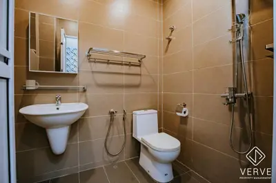 a bathroom with a toilet and a sink and a shower at Ipoh VastBlue Escape Pool Villa 6B6B 23Pax in Ipoh