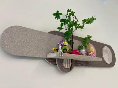 a skateboard on a wall with a plant on a shelf at Karaoke Cozy Landed Home at Sutera n Paradign for 10pax in Gua Sai