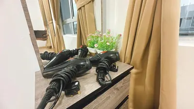 a pile of video cameras sitting on a window sill at A29 Ella Dato Onn 23 Max 10 People in Gua Sai