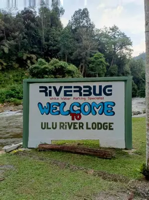 a sign for the riverside welcome to u river lodge at Ulu River Lodge, Riverbug Perak in Gopeng