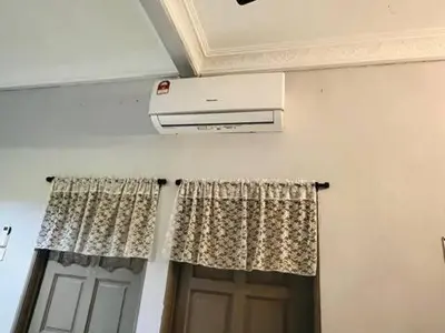 a room with a window with a heater and a door at Pa&Ma HomeStay Kulim III 3R2B FullyAircond in Gua Sai