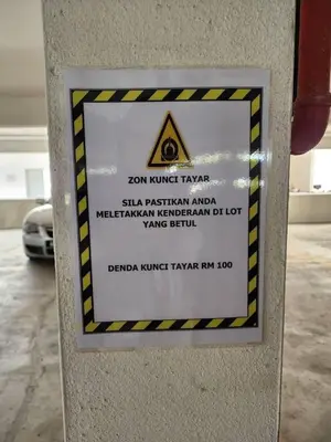 a sign on the side of a wall at Sky9Haven Homestay in Ipoh