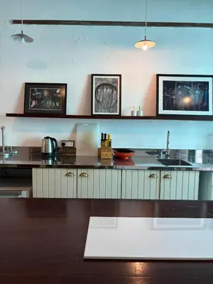 a kitchen with a sink and a counter top at Ah Tong Residence - 3 mins to Kimberley Night Market in George Town