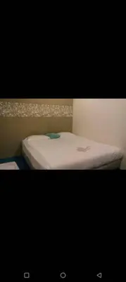 a picture of a bed in a room at Hotel Tropicanna Pulai Point in Ipoh