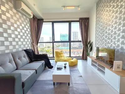 a living room with a couch and a large window at Urban Suites, 4 Plus 2 Pax, 2 Bedrooms Apartment in Jelutong