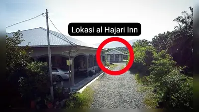 a house with a sign that readslost a light inn at al Hajari Inn - For Islam Only - Kg Banggol Batu Lenggong in Kampong Banggol Belimbing
