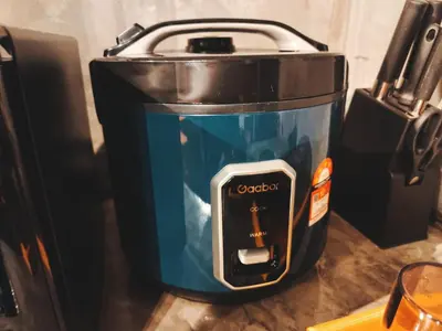 a slow cooker sitting on top of a counter at Afqa Nest Industrial Charm in Gua Sai